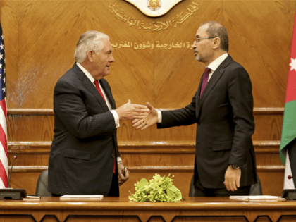 U.S. Secretary of State Rex Tillerson, left, shakes hands with Jordan's Foreign Minister Ayman Safadi in Amman, Jordan, Wednesday, Feb. 14, 2018. The Trump administration is set to boost aid to Jordan by more than $1 billion over the next five years, in spite of President Donald Trump's repeated threats …