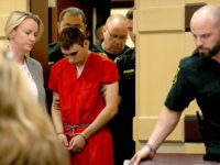 nikolas-cruz-florida-school-shooter-feb-19-2018-getty FT. LAUDERDALE - FEBRUARY 19: Nikolas Cruz appears in court with attorney Melissa McNeil (L) for a status hearing before Broward Circuit Judge Elizabeth Scherer on February 19, 2018 in Ft. Lauderdale, Florida. Cruz is facing 17 charges of premeditated murder in the mass shooting at Marjory Stoneman Douglas High …