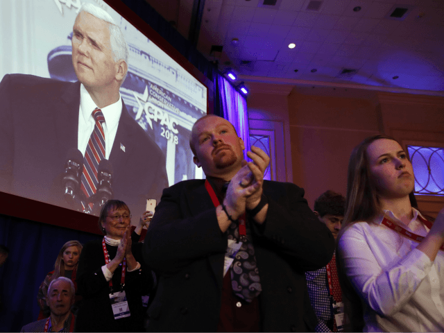 Attendees applaud Vice President Mike Pence as he speaks at the Conservative Political Act