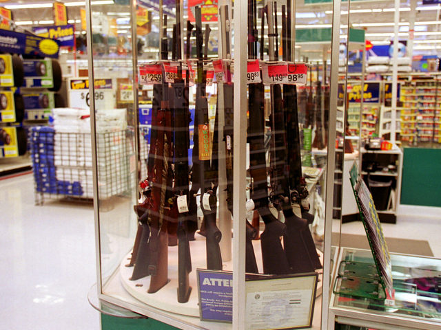 373812 02: Guns for sale at a Wal-Mart, July 19, 2000. Wal-Mart and one of their chief spo