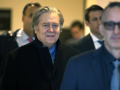 WASHINGTON, DC - FEBRUARY 15: Former White House chief strategist Steve Bannon (C) arrives to speak at a closed-door meeting with the House Intelligence Committee February 15, 2018 on Capitol Hill in Washington, DC. Bannon showed up to meet with the committee after the meeting was pushed back for three …