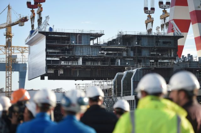 Italian shipmaker Fincantieri buys 50% of French yard STX