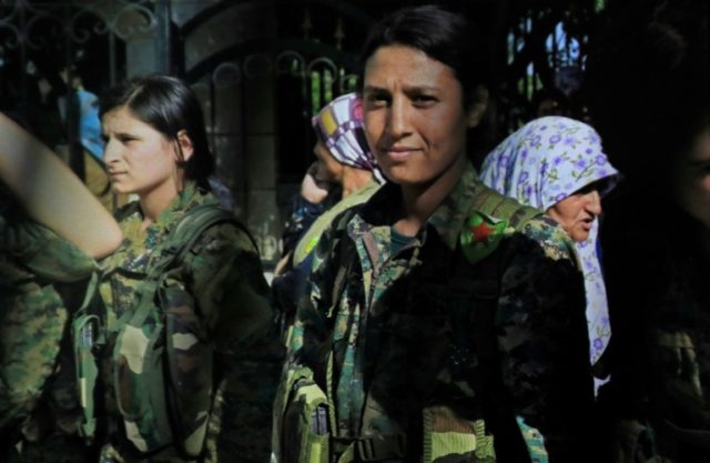 Syria Kurds outraged over mutilated body of female fighter