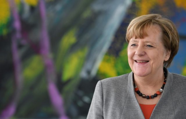 Merkel says she plans to govern for full four-year term