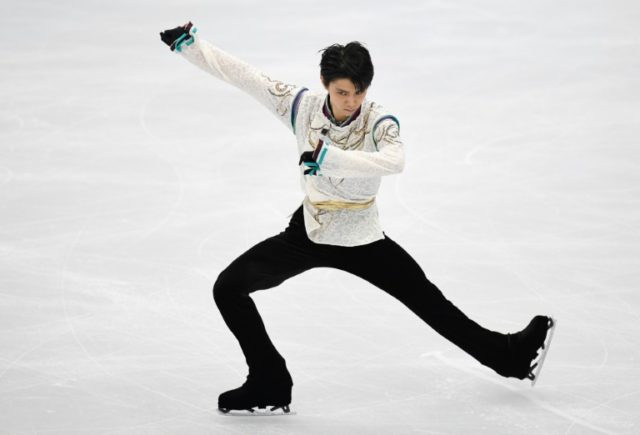 'Ice Prince' Hanyu touches down for Olympic defence