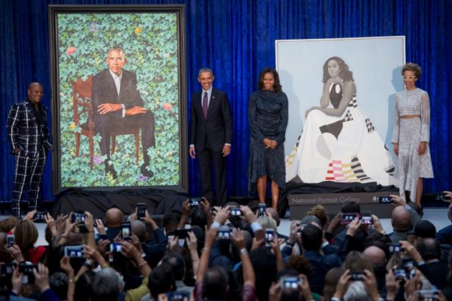 Obamas reveal unconventional portraits in Washington