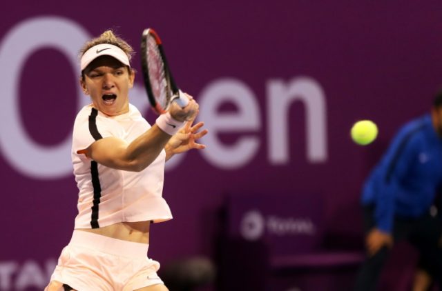Halep wins on return in Qatar but concerns remain about injury