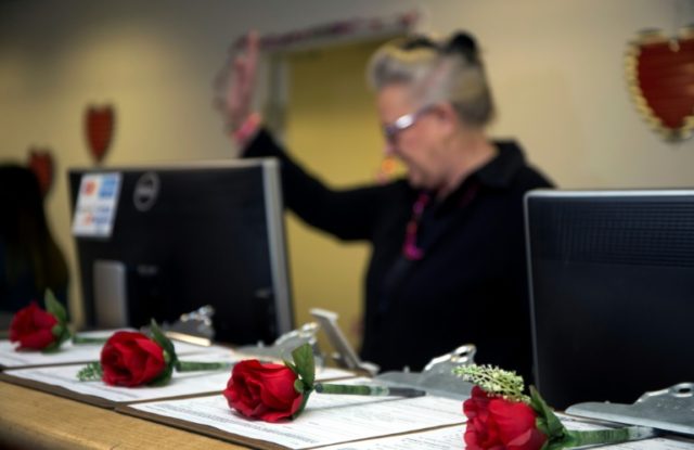 Valentines get quickie marriage licenses at Las Vegas airport
