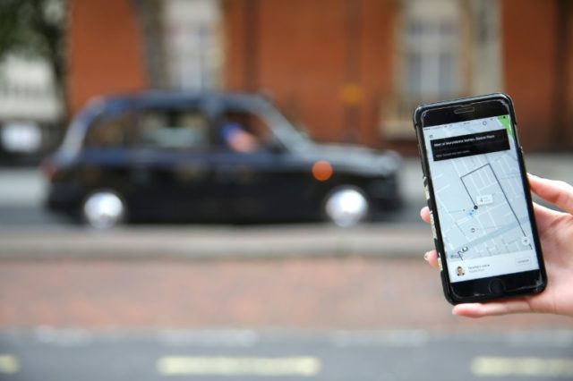 Uber introduces UK safety measures amid licence battle