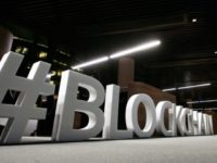 Giant letters, reading the word "blockchain" are displayed at the blockchain center, which aims at boosting start-ups, in Lithuania's capital Vilnius Blockchain revolution comes to world of humanitarian aid