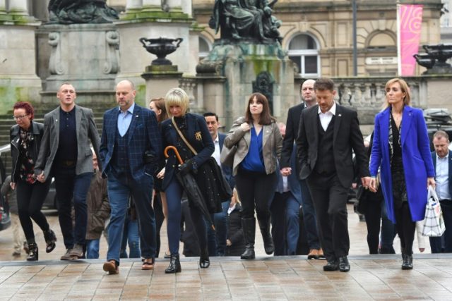 Abuse victims of former football coach Barry Bennell outside Liverpool Crown Court where he was jailed for 30 years with the judge calling him ~"sheer evil" 'Evil' UK paedophile football coach jailed for 30 years