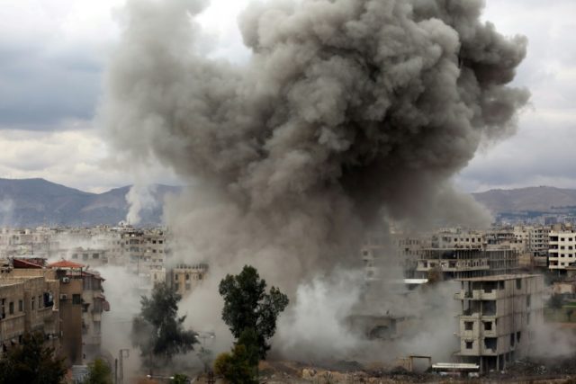 Strikes pound Syria enclave as world fumbles for response