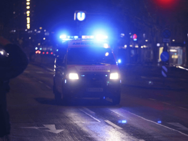 336b0o_austria-knife-attack-62830-an-ambulance-drives-on-street-people-injured