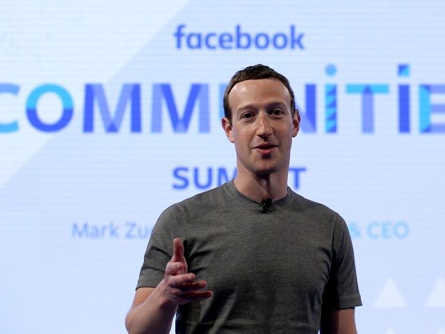 In this Wednesday, June 21, 2017, photo, Facebook CEO Mark Zuckerberg speaks in preparation for the Facebook Communities Summit, in Chicago, in advance of an announcement of a new Facebook initiative designed to spur people to form more meaningful communities with Facebook's groups feature. (AP Photo/Nam Y. Huh)