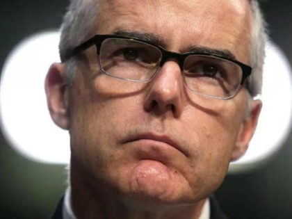 Acting FBI Director Andrew McCabe testifies before the Senate Intelligence Committee with the other heads of the U.S. intelligence agencies in the Hart Senate Office Building on Capitol Hill May 11, 2017 in Washington, DC. The intelligence officials were questioned by the committee during the annual hearing about world wide …