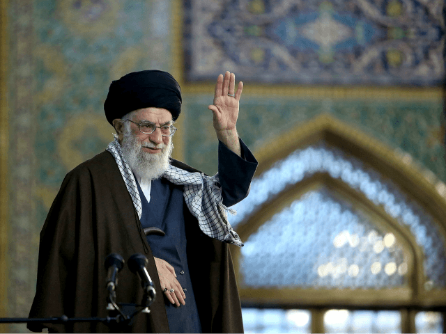 In this picture released by the office of the Iranian supreme leader on Wednesday, March 21, 2018, Supreme Leader Ayatollah Ali Khamenei waves to his supporters during his visit to Mashhad, 900 km (540 miles) east of Tehran, Iran. (Office of the Iranian Supreme Leader via AP)