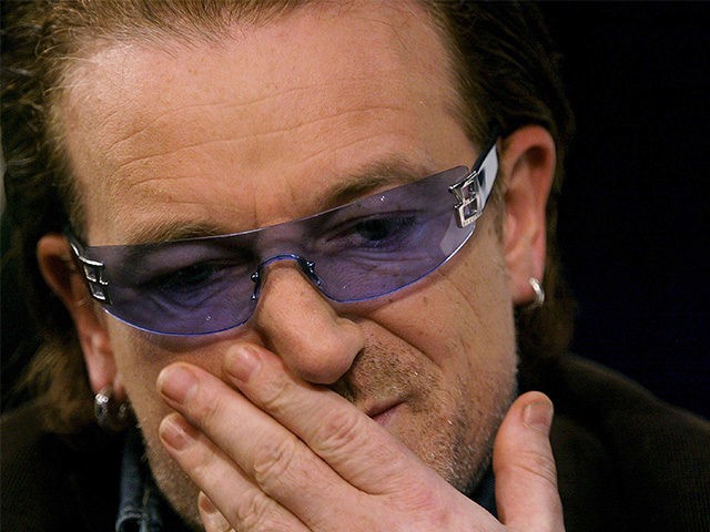 WASHINGTON - DECEMBER 3: Bono, lead singer of the rock group U2, speaks about AIDs Decembe