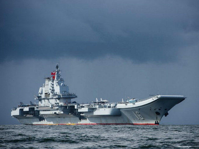 China's sole aircraft carrier, the Liaoning, arrives in Hong Kong waters on July 7, 2017,