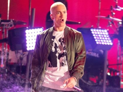 Recording artists Eminem performs onstage at the 2014 MTV Movie Awards at Nokia Theatre L.A. Live on April 13, 2014 in Los Angeles, California. (Photo by Christopher Polk/Getty Images for MTV)