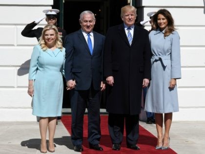 US President Donald Trump and First Lady Melania Trump greet Israel Prime Minister Benjamin Netanyahu and Sara Netanyahu of Israel at the White House March 5, 2018 in Washington, DC. The prime minister is on an official visit to the US until the end of the week. (Photo by Olivier …
