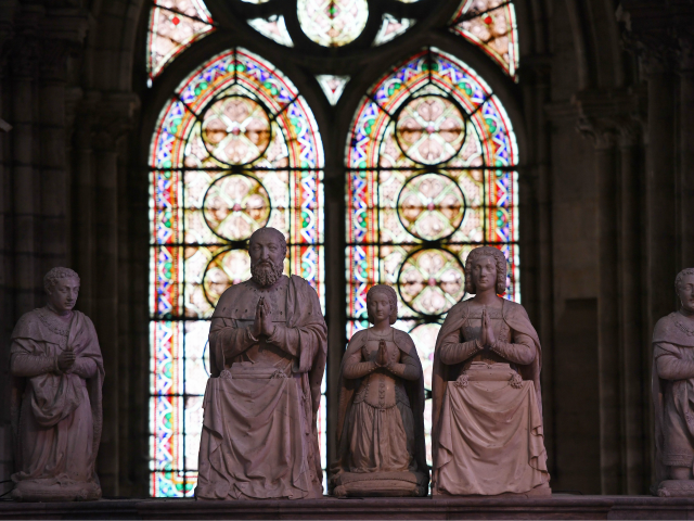 This picture taken on October 19, 2016, in Saint-Denis, northern Paris, shows statutes at