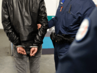 Police officers of the Brigade des Réseaux Ferrés (BRF - Railway Network Squad) detain a man during a patrol in the metro in Paris on November 2, 2016. / AFP PHOTO / FRANCOIS GUILLOT (Photo credit should read FRANCOIS GUILLOT/AFP/Getty Images)