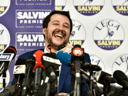 Lega far right party leader Matteo Salvini laughs during a press conference held at the Lega headquarter in Milan on March 5, 2018 ahead of the Italy's general election results. A surge for populist and far-right parties in Italy's weekend election could result in a hung parliament with a right-wing …