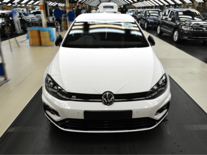 WOLFSBURG, GERMANY - MARCH 08: The front of a Volkswagen Golf car is displayed at an assembly line at the Volkswagen factory on March 8, 2018 in Wolfsburg, Germany. U.S. President Donald Trump has threatened to impose tariffs on imports of cars made in Europe in an ongoing and escalating …