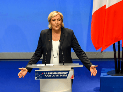 French far-right party Front National president Marine Le Pen speaks during her party's congress on March 11, 2018 in Lille, north of France, after being re-elected for a third term as leader. The 49-year-old is expected to unveil the party's new identity, burying the National Front (FN) name that has …