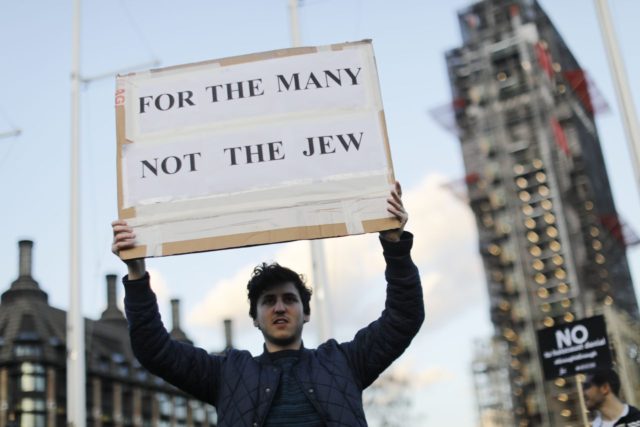 Members of the Jewish community hold a protest against Britain's opposition Labour pa