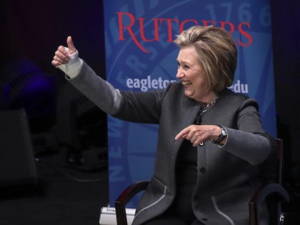 PISCATAWAY, NEW JERSEY - MARCH 29: Former Secretary of State and former First Lady Hillary Clinton gives the thumbs up after speaking at Rutgers University, March 29, 2018 in Piscataway, New Jersey. Clinton is being paid $25,000 for her appearance. The money will come from a university endowment fund, according …
