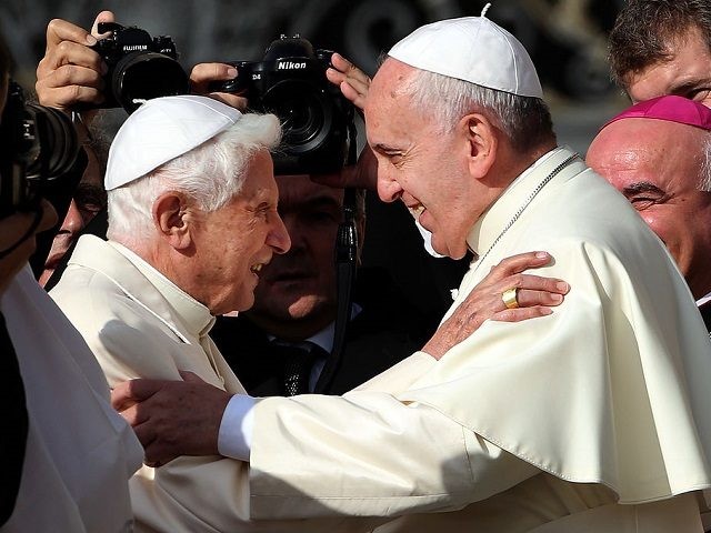 VATICAN CITY, VATICAN - SEPTEMBER 28: Pope Francis (R) greets Pope Emeritus Benedict XVI as he arrives at St. Peter's Basilica during a celebration for grandparents and the elderly on September 28, 2014 in Vatican City, Vatican. Pope Francis celebrated Mass on Sunday morning in St Peter's Square, following a …