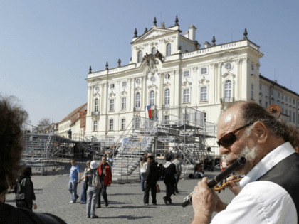 Street musicians play their instruments as tourist walk past the stage where US President Barack Obama will deliver his public speech on Sunday April 5, at the Hradcanske Square in Prague, Czech Republic on Friday, April 3, 2009. Obama will attend a summit between the United States and the 27-member …