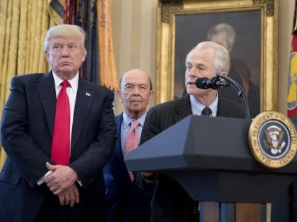 National Trade Council adviser Peter Navarro, second from right, accompanied by from left, President Donald Trump, Secretary of Commerce Wilbur Ross, and Vice President Mike Pence, speaks during a signing ceremony for executive orders regarding trade in the Oval Office at the White House, Friday, March 31, 2017, in Washington. …