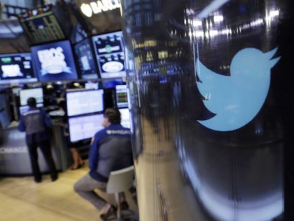 FILE - In this Tuesday, Oct. 13, 2015, file photo, the Twitter logo appears on a phone post on the floor of the New York Stock Exchange. Twitter said Thursday, Aug. 18, 2016, it has suspended 360,000 accounts since mid-2015 for violating its policies banning the promotion of terrorism and …