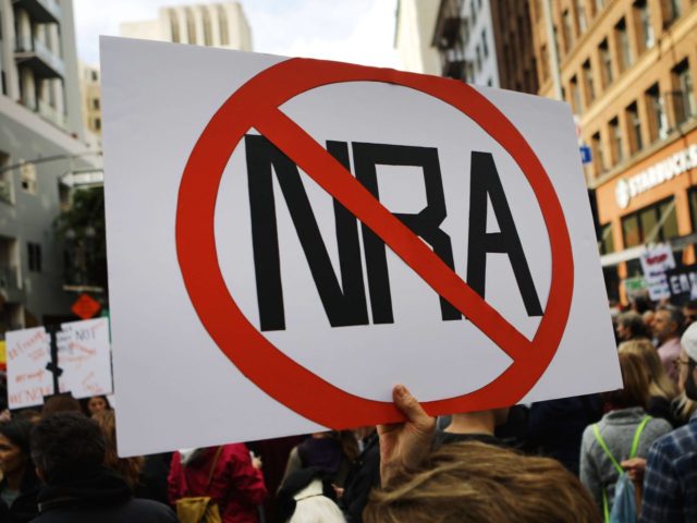anti-NRA sign at March for our Lives (Mario Tama / Getty)