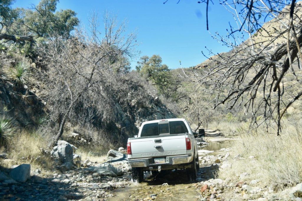 It takes more than 90 minutes on rough roads and creeks to travel the 20 miles from Jim Chilton’s ranch house to the border. (Penny Starr/Breitbart News)