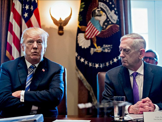 U.S. President Donald Trump speaks as Jim Mattis, U.S. secretary of defense, right, listens during a cabinet meeting at the White House in Washington, D.C., U.S., on Thursday, March 8, 2018. Trump opened the cabinet session promoting a very big meeting on steel and aluminum tariffs on Thursday afternoon. Photographer: …