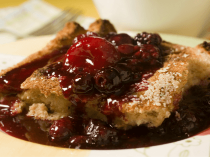 Oven-baked French Toast with Mixed Berry Sauce is seen in this Monday, Feb. 2, 2009 photo. Breakfast is a meal that is easy and inexpensive to turn into a special event. This dish can be tailored to use whatever your favorite berry is. (AP Photo/Larry Crowe)