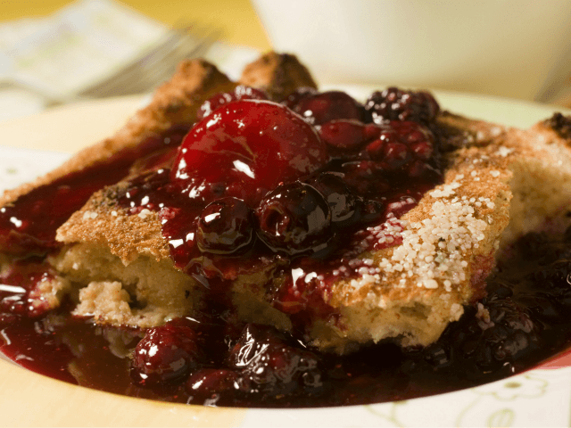 Oven-baked French Toast with Mixed Berry Sauce is seen in this Monday, Feb. 2, 2009 photo.