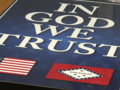 The school districts of Bentonville and Pea Ridge will soon have "In God We Trust" posters displayed in classrooms after the implementation of a new law.