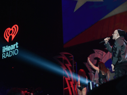 Yandel performs at an iHeartRadio concert for iHeartMedia