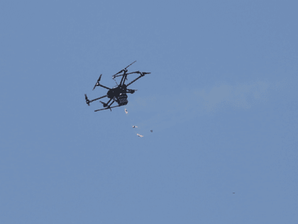 A drone used by Israeli troops fires teargas at Palestinians during a demonstration near the Gaza Strip border with Israel, in eastern Gaza City, Friday, March 30, 2018. Palestinians clashed with Israeli troops along the Gaza border Friday morning as thousands gathered there for mass sit-ins led by the militant …