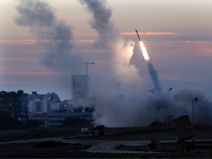 The Iron Dome defense system fires to interecpt incoming missiles from Gaza in the port to