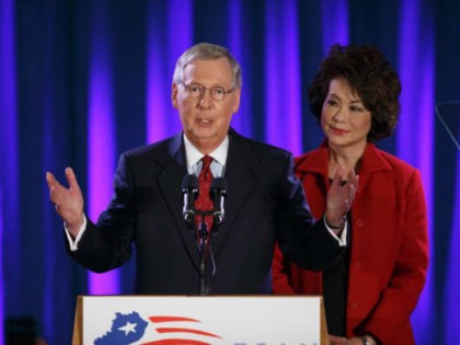Senate Minority Leader Mitch McConnell of Ky., joined by his wife, former Labor Secretary Elaine Chao, celebrates with his supporters at an election night party in Louisville, Ky.,Tuesday, Nov. 4, 2014. McConnell won a sixth term in Washington, with his eyes on the larger prize of GOP control of the …