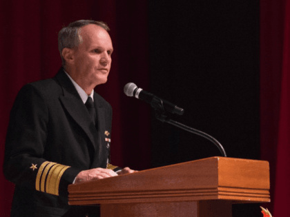 Vice Adm. Phillip G. Sawyer addresses attendees of the USS John S. McCain Memorial Service