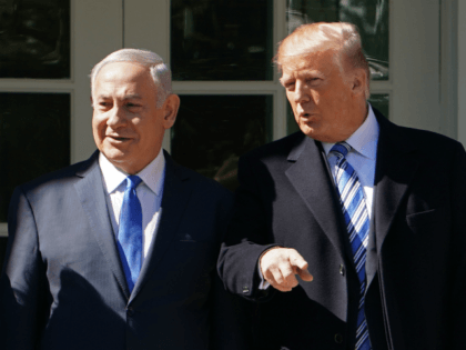 US President Donald Trump poses for a photo with Israel's Prime Minister Benjamin Netanyah