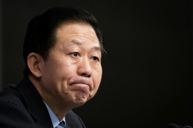 China's finance minister waves away debt concerns
