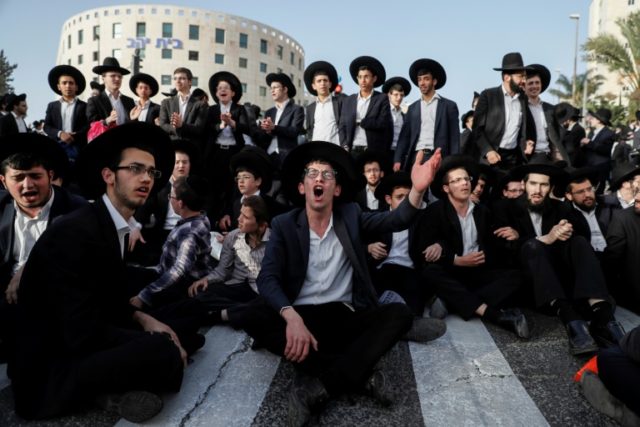 Israel ultra-Orthodox Jews rally against military service