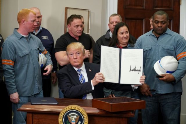Trump signs sweeping tariffs, sparking outrage, trade war fears